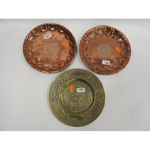 285 - Chinese chiselled brass dish and two copper dishes (3)