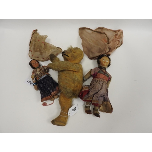 286 - Old Loveworn legless teddy bear, two Indian souvenir dolls