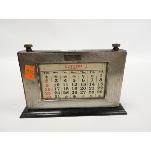 308 - Silver faced wooden desk calendar, hallmark Birmingham 1930