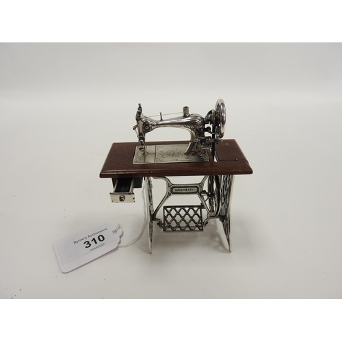 310 - Modern sterling silver and wooden model of a traditional treadle sewing machine