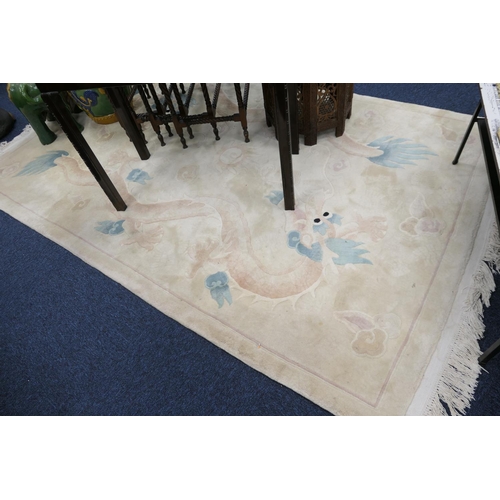 754 - Chinese fawn ground sculpted woollen rug