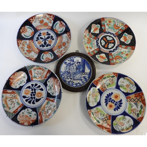 168 - Four Japanese Imari plaques, all late Meiji, 30.5cm diameter, and an Oriental blue and white circula... 