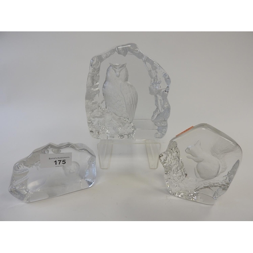 175 - Three Mats Jonasson clear glass intaglio wildlife sculptures, together with a single box