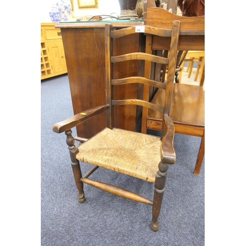 496 - Child's rush seated ash ladderback armchair