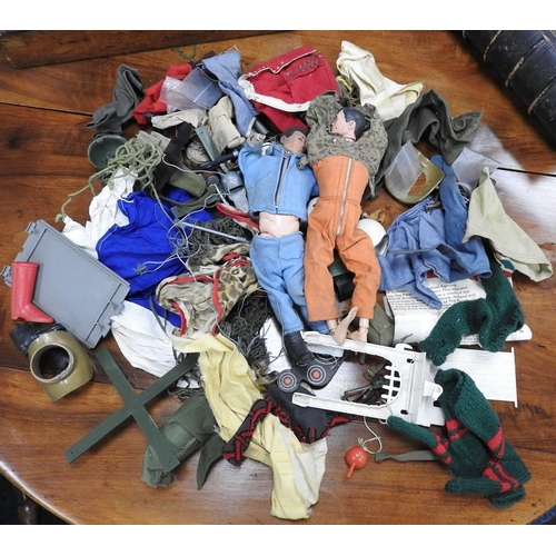 64 - Two Action Men and a small quantity of associated clothing and accessories (1 box)