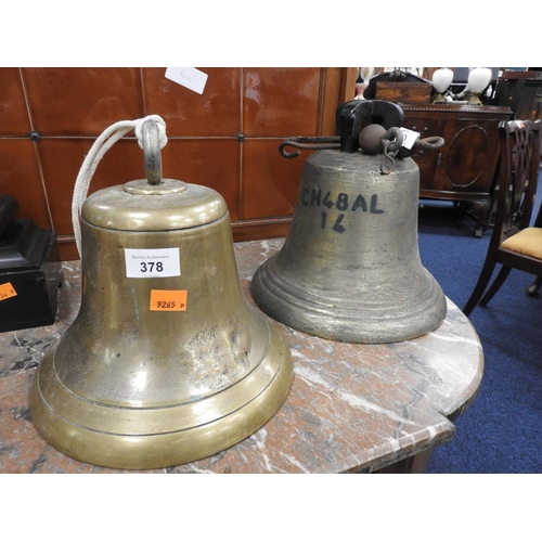 378 - Two cast metal bells with two clappers, the largest 26cm diameter