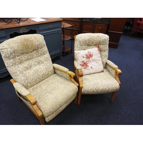 387 - Two modern elm and fabric upholstered armchairs, one being a recliner