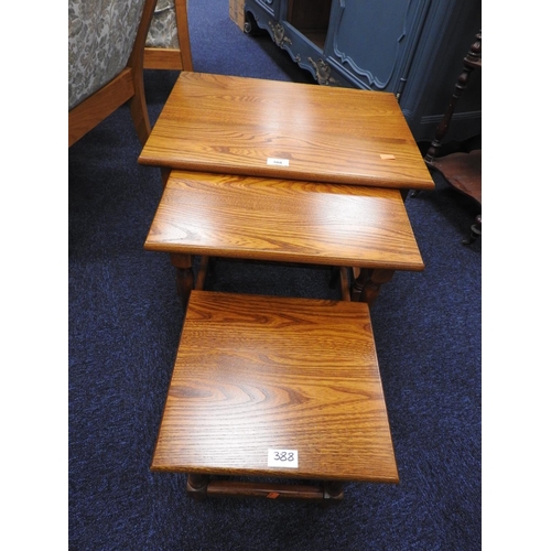 388 - Modern nest of oak occasional tables