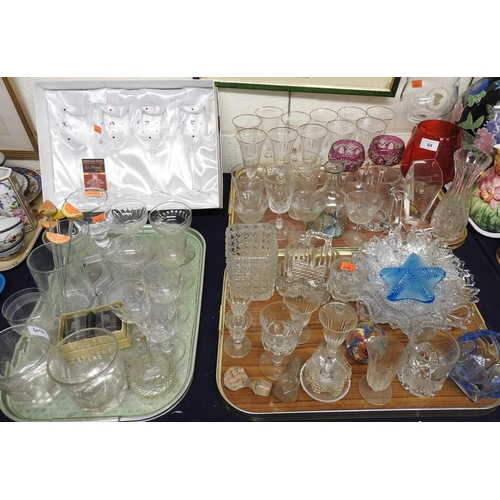 64 - Assorted glassware including two amethyst hock glasses, pedestal wine glasses, moulded serving dishe... 