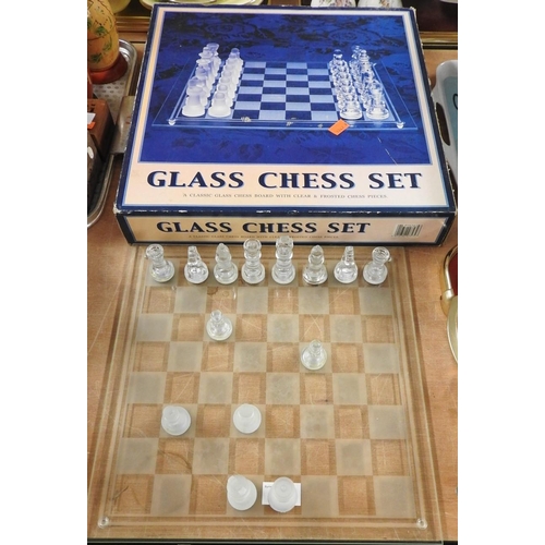 73 - Glass chessboard and pieces, boxed