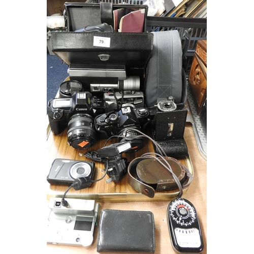 79 - Assortment of cameras and accessories including a Canon EOS650 35mm camera with 35-70mm lens; Cosina... 