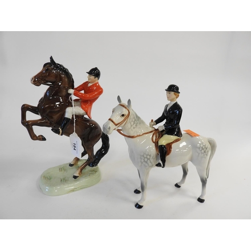 184 - Beswick Huntswoman and Huntsman on rearing horse (2)