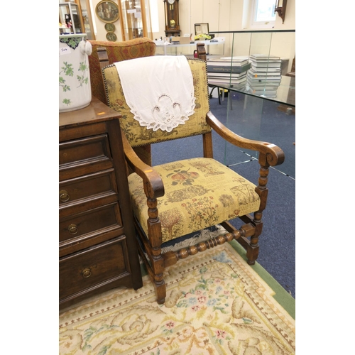 597 - Oak and tapestry upholstered open armchair in the 17th Century style, width 58cm