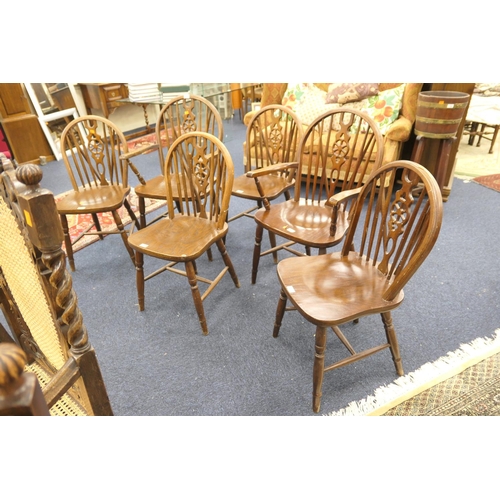 601 - Set of six wheelback dining chairs comprising four and two