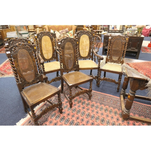 604 - Set of six Carolean Revival oak barley twist dining chairs comprising two carvers and four singles, ... 