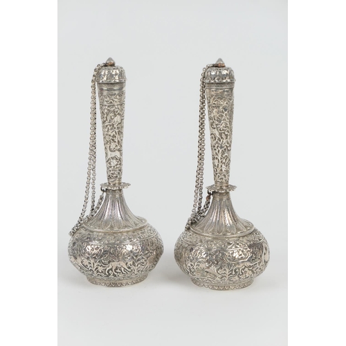 100 - Pair of Persian silver scent flasks, circa 1900, baluster form with slender necks, domed cover and a... 