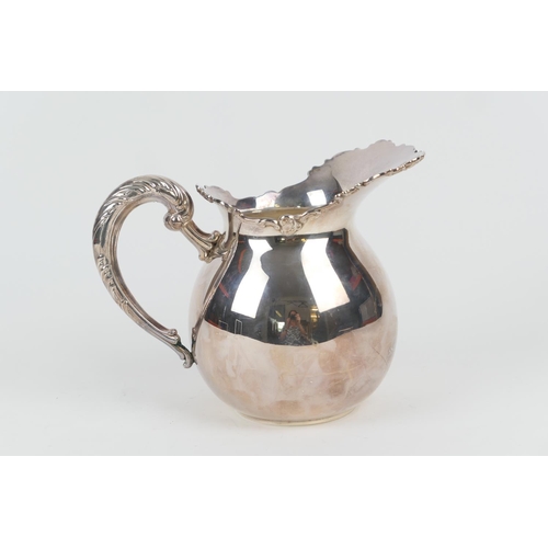 105 - Peruvian sterling silver pitcher, Sheffield import marks for 1981, plain baluster form, height 17cm,... 