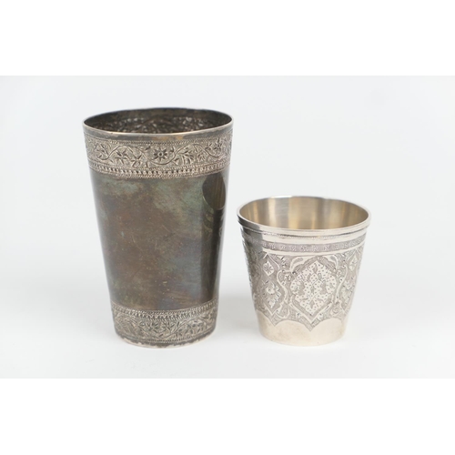 107 - Indo-Persian white metal beaker, circa 1900, tapered form decorated with bands of scrolling foliage,... 