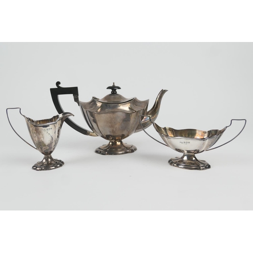 116 - George V silver three piece tea service, Birmingham 1926, comprising teapot of footed and fluted ova... 