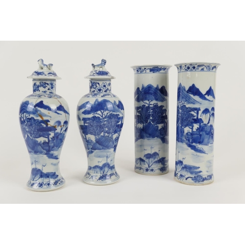 12 - Two pairs of Chinese blue and white vases,  late 19th Century, two being of lidded baluster form and... 