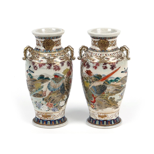 22 - Pair of Japanese Satsuma vases, Meiji (1868-1912), twin handled ovoid form decorated with pheasant o... 