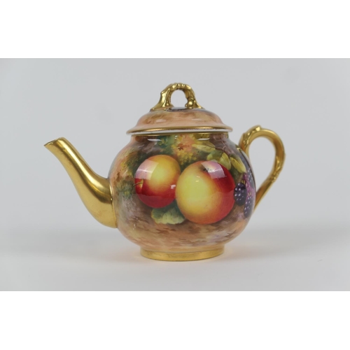 29 - Royal Worcester fruit decorated small teapot and cover,  circa 1945 - 55, decorated with apples and ... 