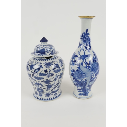35 - Chinese blue and white jar and cover, late 19th Century, decorated with birds and butterflies, dispe... 