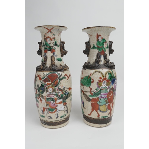 56 - Pair of Chinese crackle glazed vases, early 20th Century, the neck with salamanders, decorated with ... 
