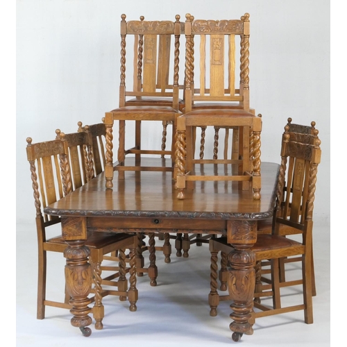 589 - Victorian carved oak extending dining table, and a set of twelve oak barleytwist dining chairs, the ... 