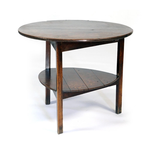 593 - Oak cricket table, early 19th Century, circular two plank top, 85cm diameter, raised on elm chamfere... 