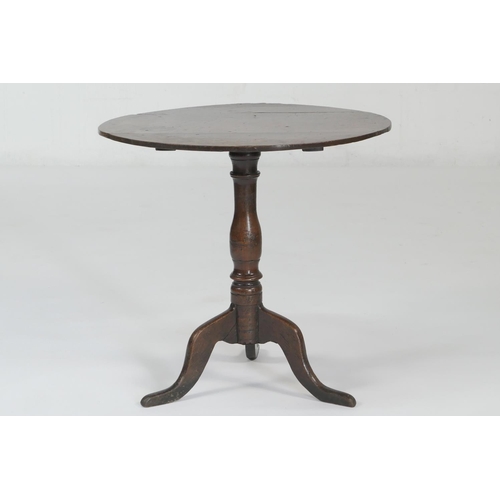 602 - Provincial oak pedestal tripod table, early 19th Century, circular top on a turned and ringed slende... 