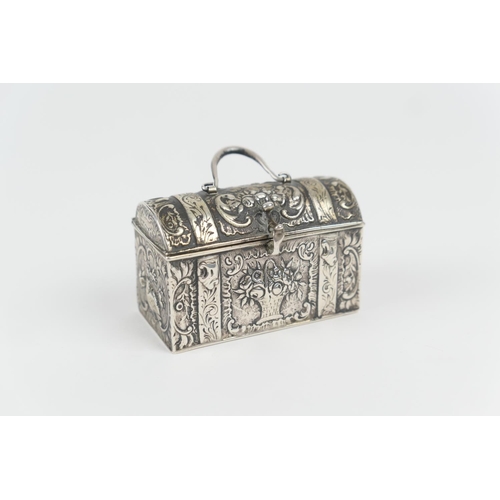 67 - Dutch style white metal jewellery casket, late 19th Century, domed rectangular form, repousse decora... 