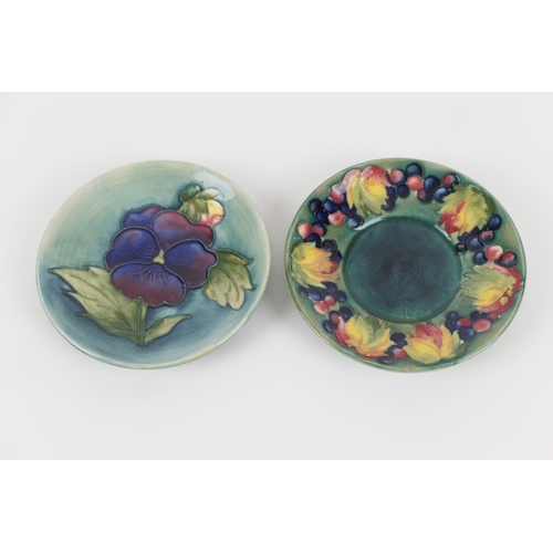 8 - Moorcroft leaf and berries saucer, impressed marks, 12cm; also a Moorcroft pansy pin dish, 12cm (2)