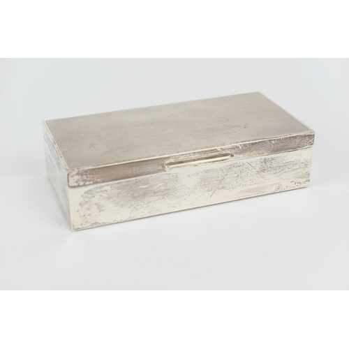 88 - Elizabeth II silver cigarette box, Birmingham 1975, engine turned cover, cedar lined interior, 18cm ... 