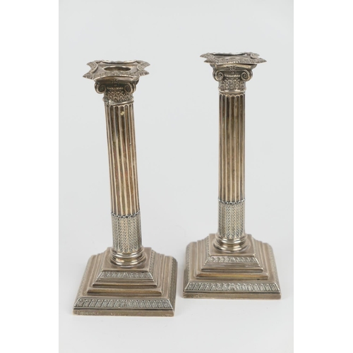 89 - Pair of late Victorian silver Corinthian column candlesticks, by Hawksworth Eyre, Sheffield 1899, re... 