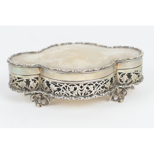 98 - George V silver trinket box by Nathan & Hayes, Chester 1912, lobed form, pierced scrolling foliate s... 