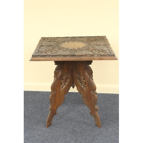 599 - Indian carved teak jardiniere stand, circa 1900-20, having a square top profusely carved with foliag... 