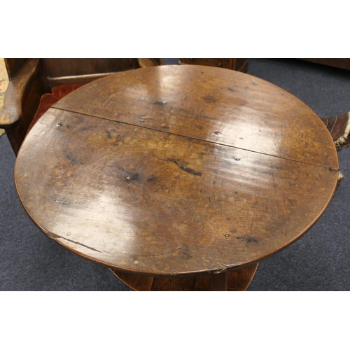 593 - Oak cricket table, early 19th Century, circular two plank top, 85cm diameter, raised on elm chamfere... 