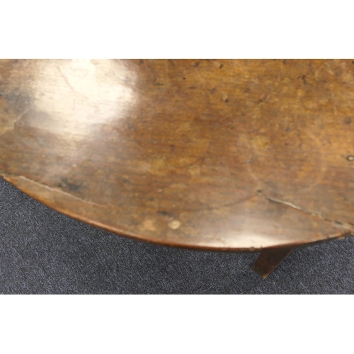 593 - Oak cricket table, early 19th Century, circular two plank top, 85cm diameter, raised on elm chamfere... 