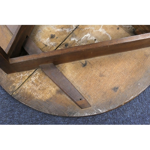 593 - Oak cricket table, early 19th Century, circular two plank top, 85cm diameter, raised on elm chamfere... 