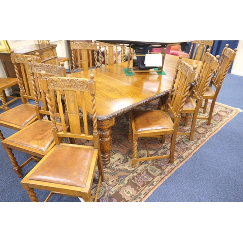 589 - Victorian carved oak extending dining table, and a set of twelve oak barleytwist dining chairs, the ... 