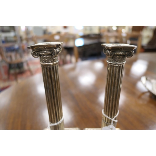 89 - Pair of late Victorian silver Corinthian column candlesticks, by Hawksworth Eyre, Sheffield 1899, re... 