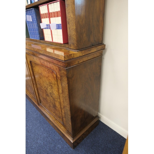 604 - Late Victorian burr walnut library bookcase, by T H Filmer & Sons, Oxford Street, London, having thr... 