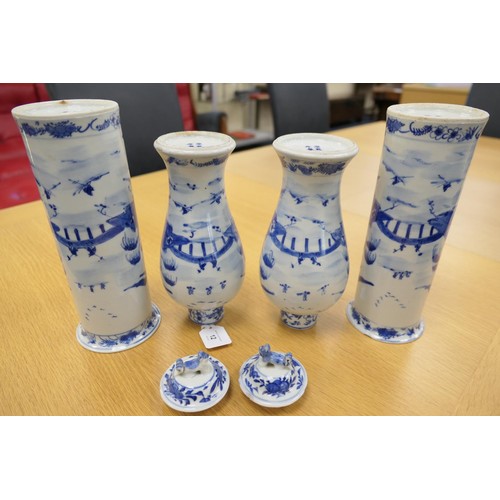12 - Two pairs of Chinese blue and white vases,  late 19th Century, two being of lidded baluster form and... 