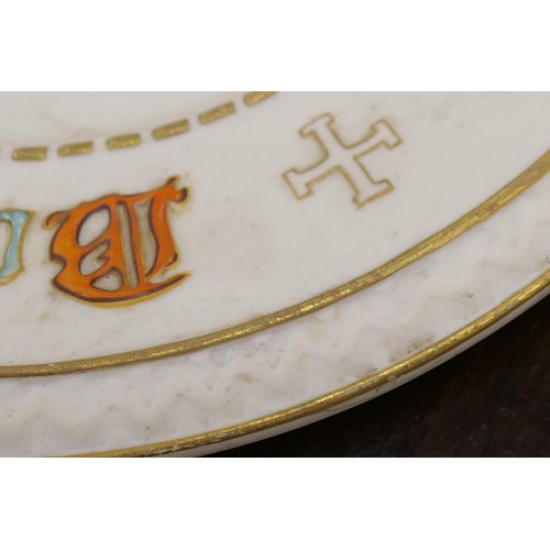 58 - Three Victorian Gothic Revival Parian plates, each moulded with a motto, decorated with gilt and col... 