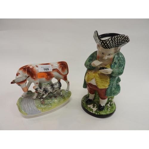 169 - Victorian Staffordshire cow and calf group, also a Victorian Staffordshire toby jug 'The Snufftaker'... 