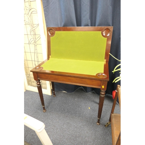 418 - Edwardian mahogany swivel top folding card table