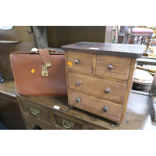 423 - Apprentice piece chest of drawers and a brown leather briefcase