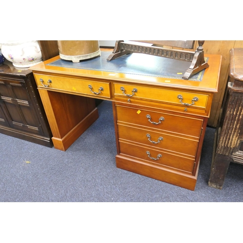 439 - Modern cherrywood finish kneehole desk with tooled leather top, width 121cm