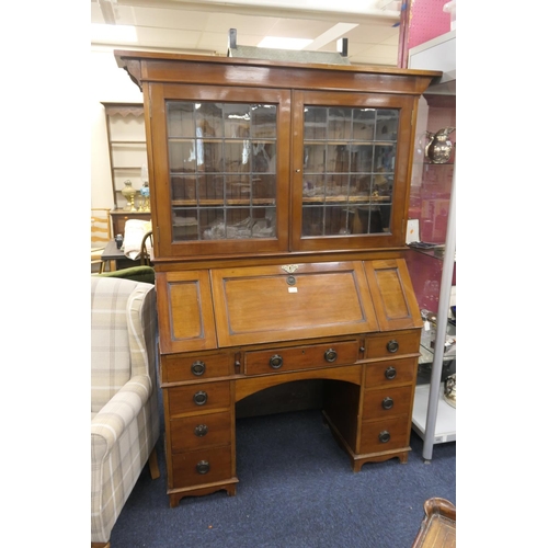 530 - Arts and Crafts period mahogany kneehole bureau bookcase, circa 1900, width 138cm, height 188cm